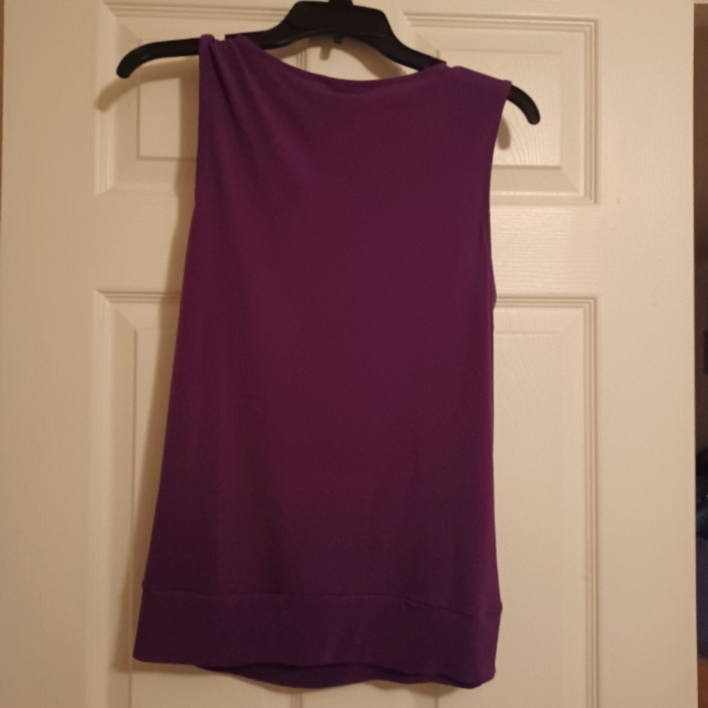 New York and Company Purple stretch blouse. Size Med